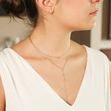 Oval Stone Surrounded with White Diamonds